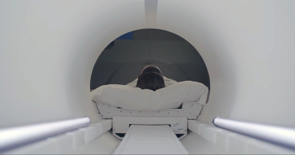 A patient is wheeled into the 7 Tesla MRI